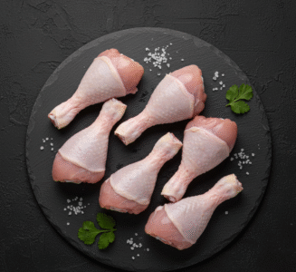 Fresh halal chicken drumsticks with skin on from Milton Keynes butcher